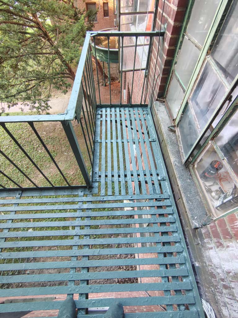 Aesthetic and Safe Repainting of Fire Escape Ladder