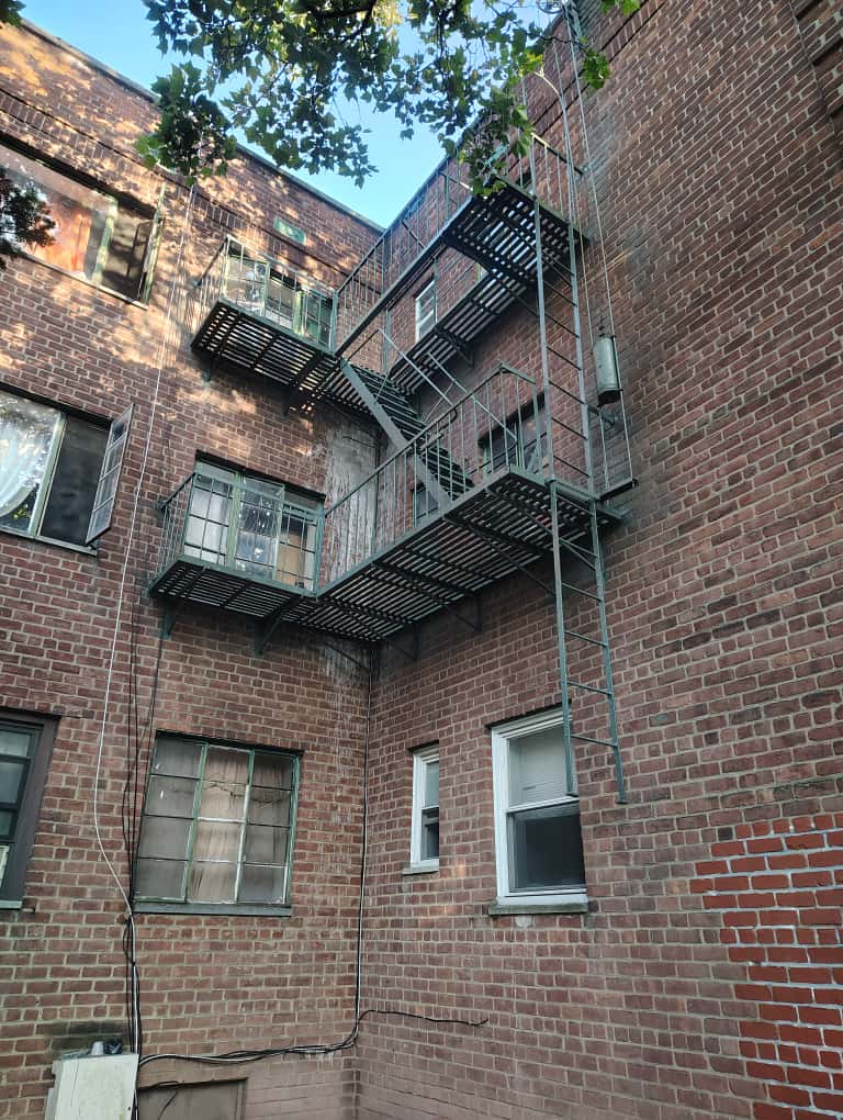 Aesthetic and Safe Repainting of Fire Escape Ladder - 4