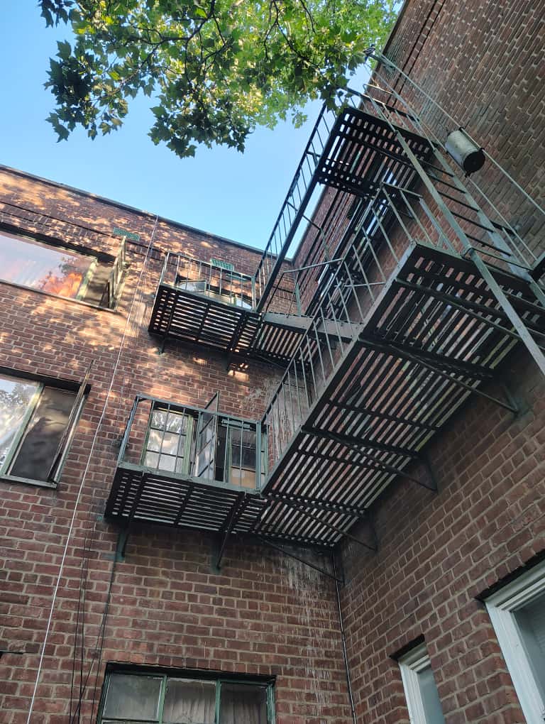 Aesthetic and Safe Repainting of Fire Escape Ladder - 5